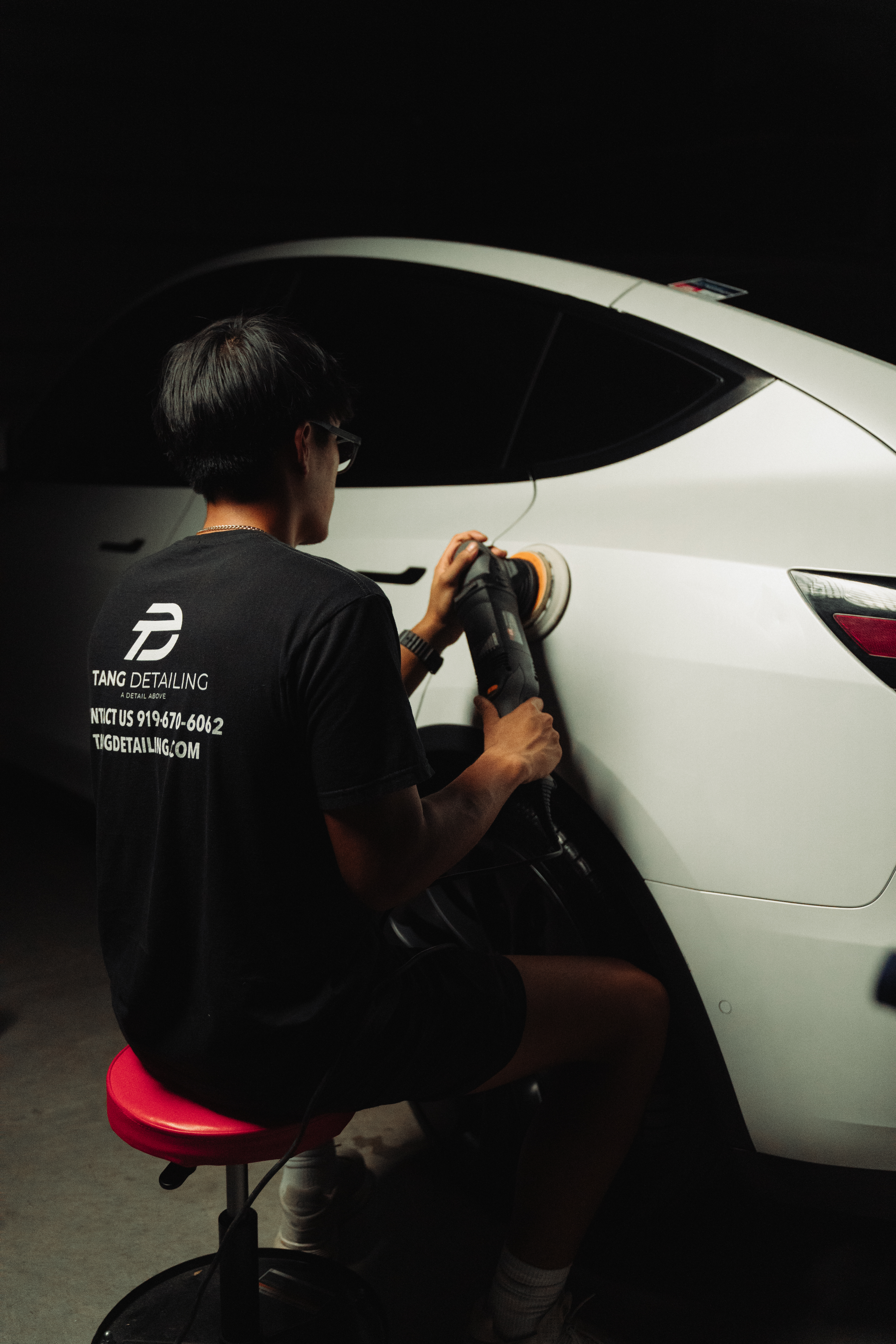 Glossy ceramic-coated paintwork on a car detailed by Tang Detailing in Raleigh NC